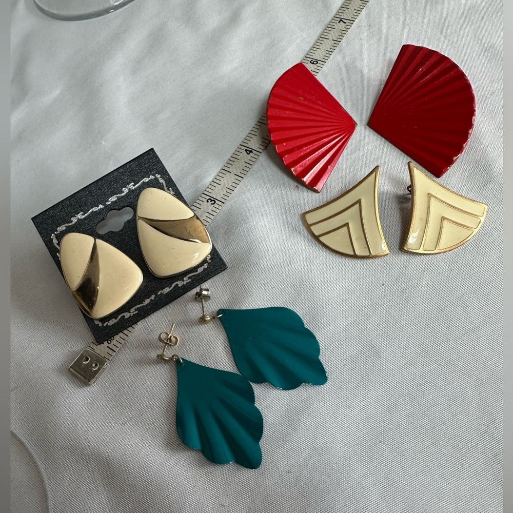 Four pair of vintage metal earrings